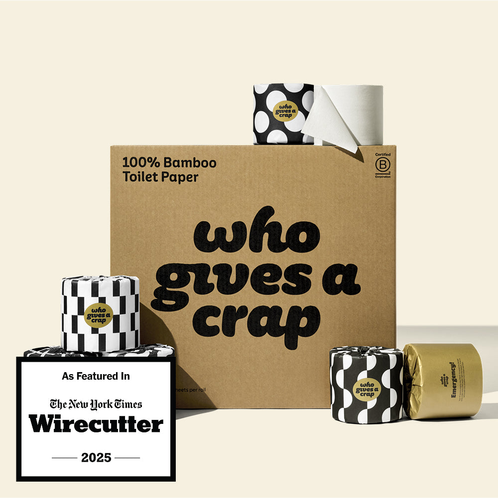A large box of Who Gives A Crap 100% Bamboo Toilet Paper with black and white wrappers - eco-friendly, biodegradable and sustainable toilet paper. There is a badge stating "As Featured in The New York Times Wirecutter" 2025